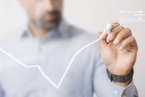 Man Giving A Business Presentation Using A Futuristic Digital Pe - Escritório de contabilidade no Rio de Janeiro